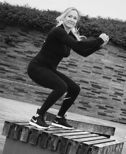 Esre Personal Trainer aan het squaten